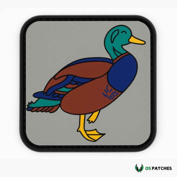 Colorful duck PVC patch with green head, brown wings, yellow feet