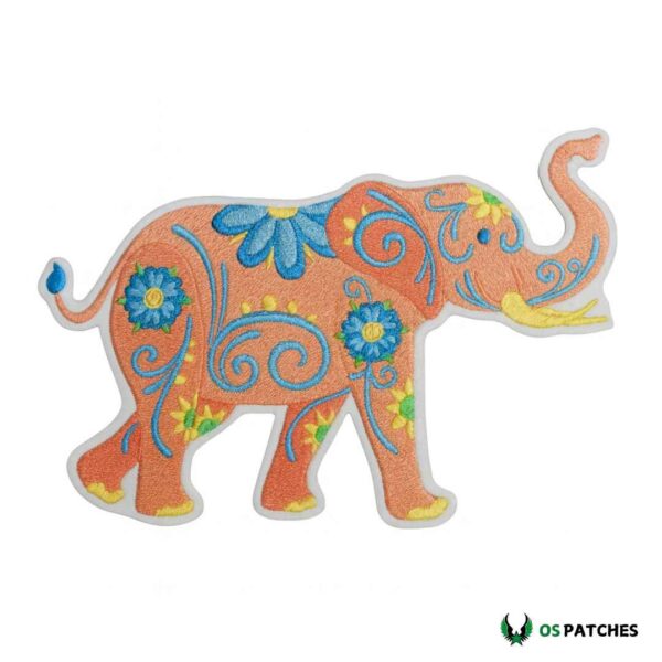 Orange embroidered elephant patch with blue floral designs and iron-on backing.