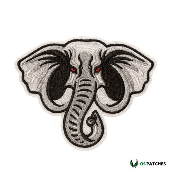 Fierce iron on embroidered elephant patch with red eyes and bold black details.