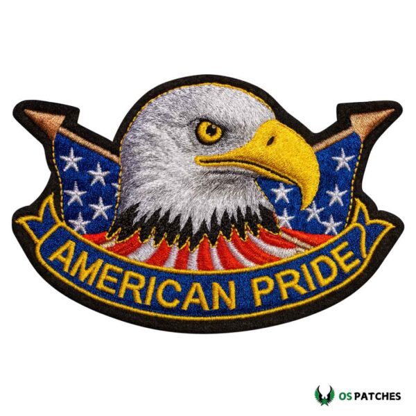 Embroidered patch with bald eagle head, U.S. flag background, and “American Pride” text.