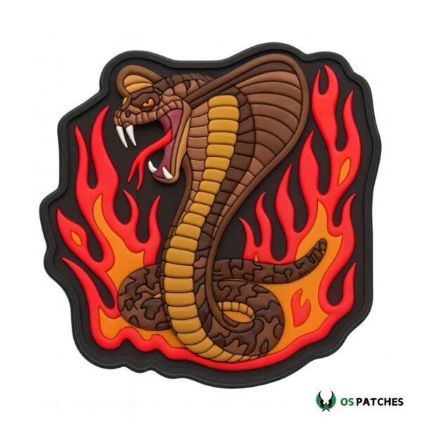 Cobra snake patch with brown body, yellow belly, open fangs, and red flames background