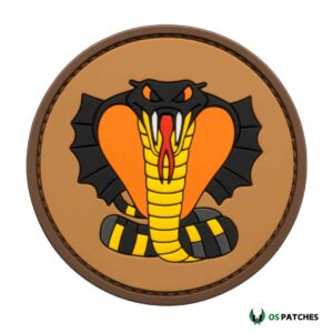 Round cobra snake patch with yellow and black body, orange hood, red tongue, and brown stitched border