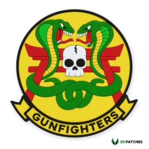 Gunfighters patch with two green cobras, white skull, red gate, and bold yellow background