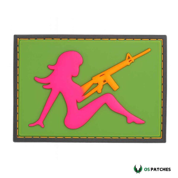 PVC patch with pink girl silhouette holding orange rifle on green background