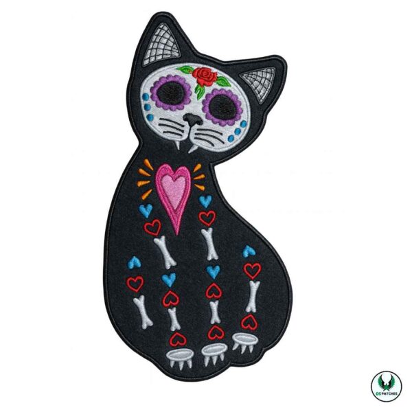 Day of the Dead style embroidered black cat patch with heart and floral details