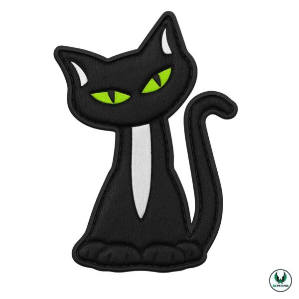 Black PVC cat patch with green eyes and white chest detail