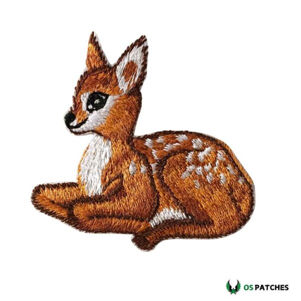 Embroidered sitting deer patch with brown fur and white spotted details
