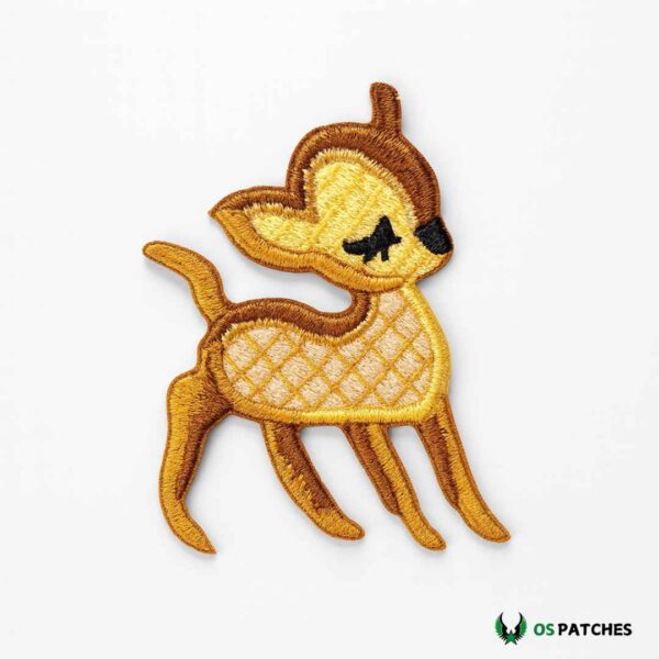 Embroidered cute deer patch with golden brown stitching and playful design