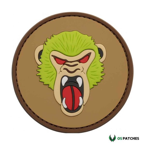 PVC angry monkey patch with green fur, red eyes and open mouth