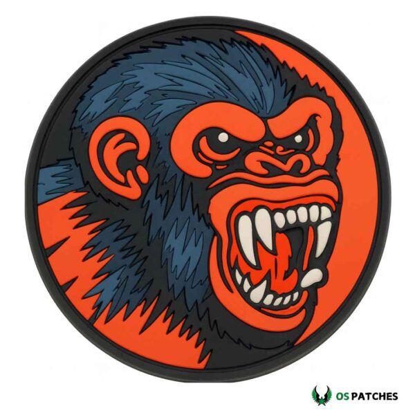 PVC gorilla patch with orange background fierce face and sharp teeth