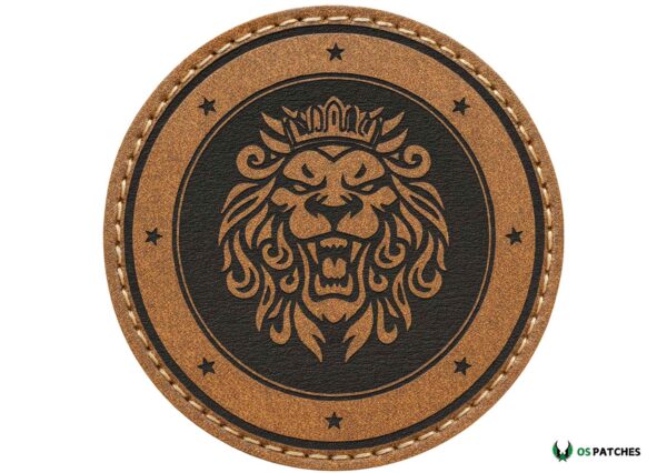 Round brown leather patch engraved with roaring lion head and crown design