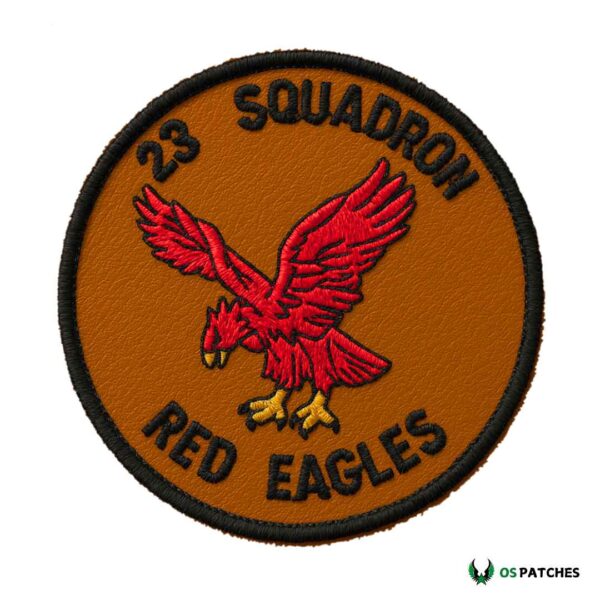 Round brown leather patch with embroidered red eagle and black text “23 Squadron Red Eagles.”