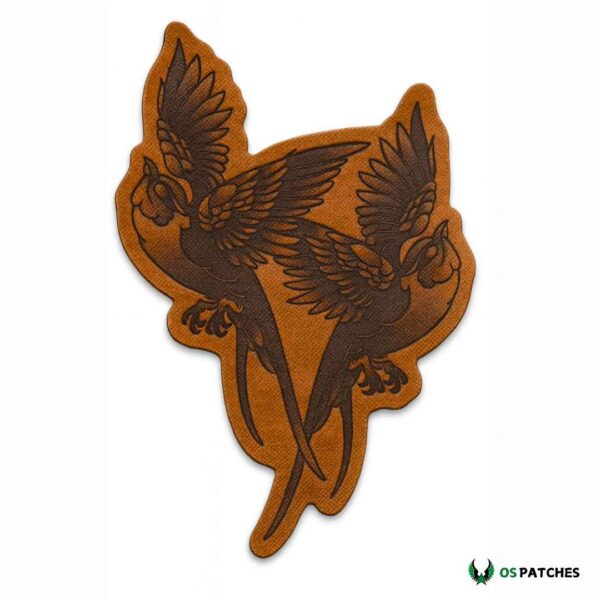 Printed leather patch with dark brown bird design on light brown leather