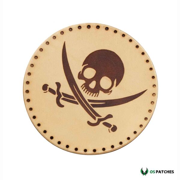 Round leather patch engraved with pirate skull and crossed swords design