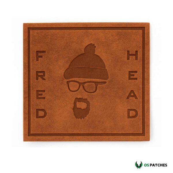 Embossed leather patch with Fred Head beanie and beard design